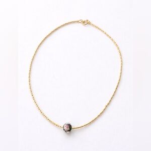 Elegant Gold Necklace with Pink and Black Bead